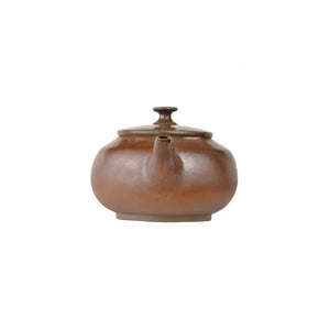 Front view of PorSva No.45 wood-fired clay teapot style 2 with natural kiln-fired surface