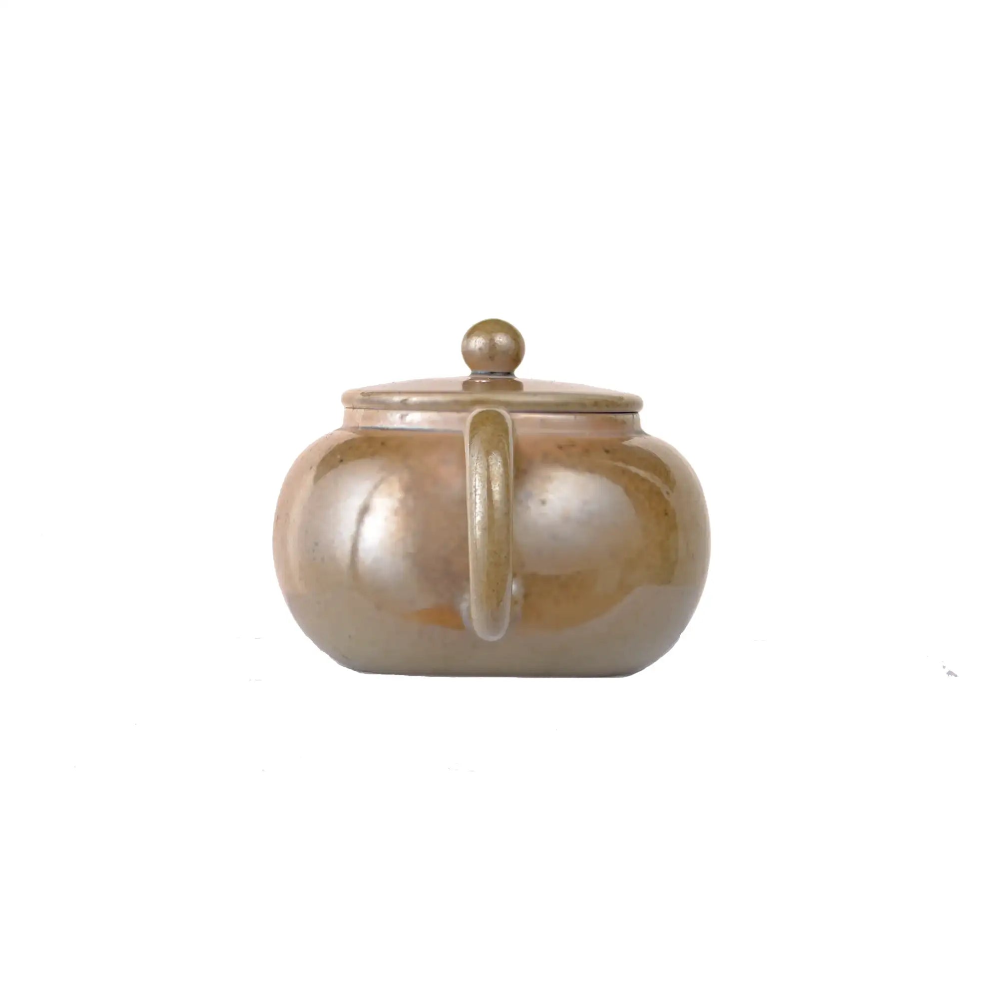 Back view of PorSva No.47 wood-fired  clay teapot displaying natural kiln transformation