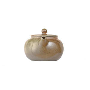 Front view of PorSva No.47 wood-fired clay teapot style 4 with natural kiln-fired surface