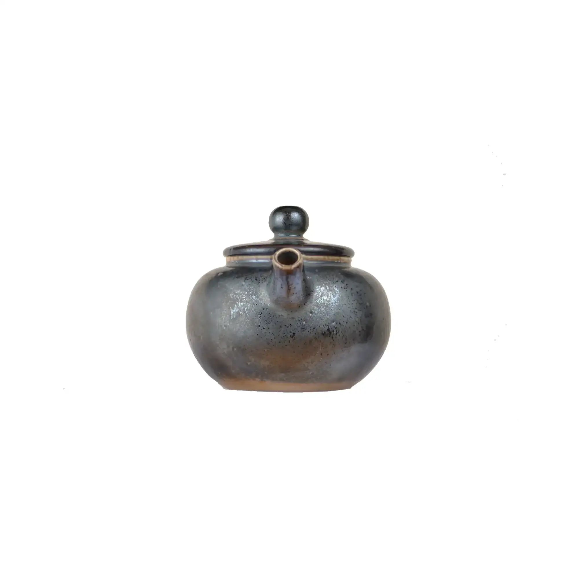 Front view of PorSva No.63 wood-fired  clay teapot showing natural kiln firing marks