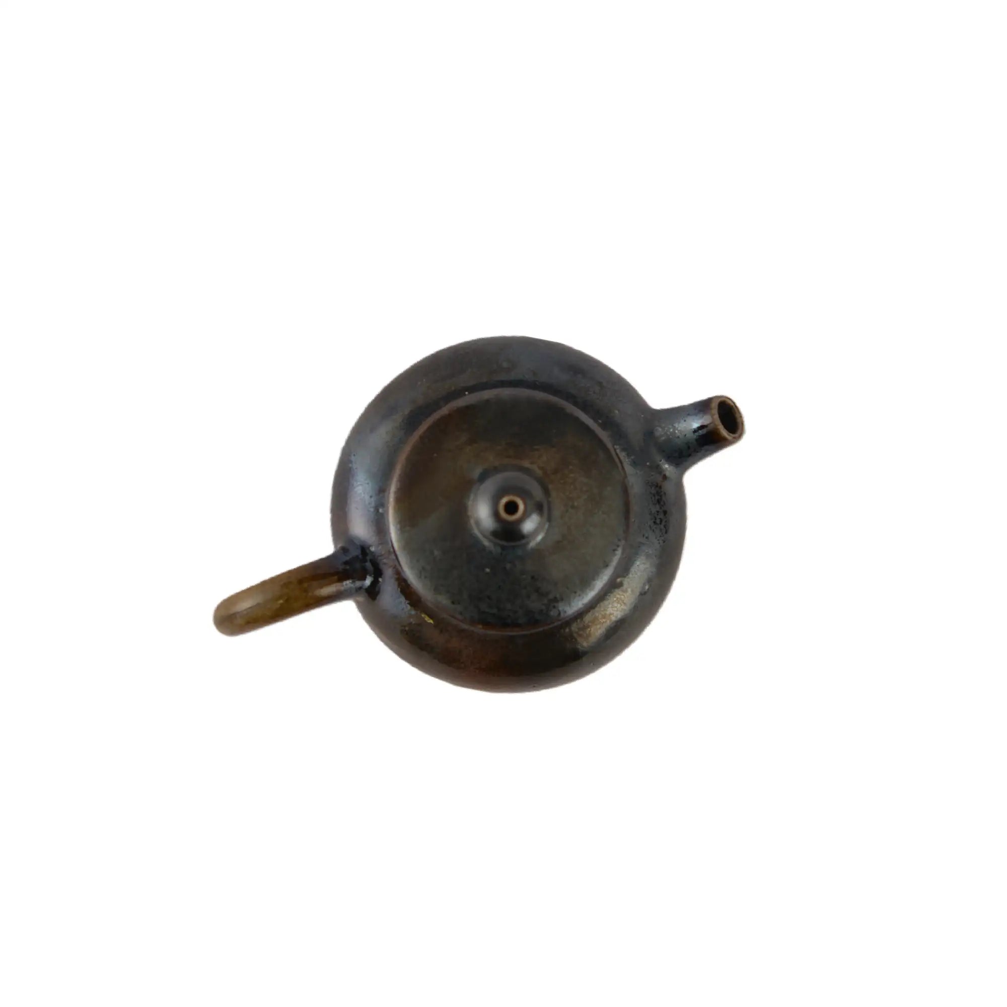 Top view of PorSva No.63 wood-fired clay teapot showing lid structure and firing texture
