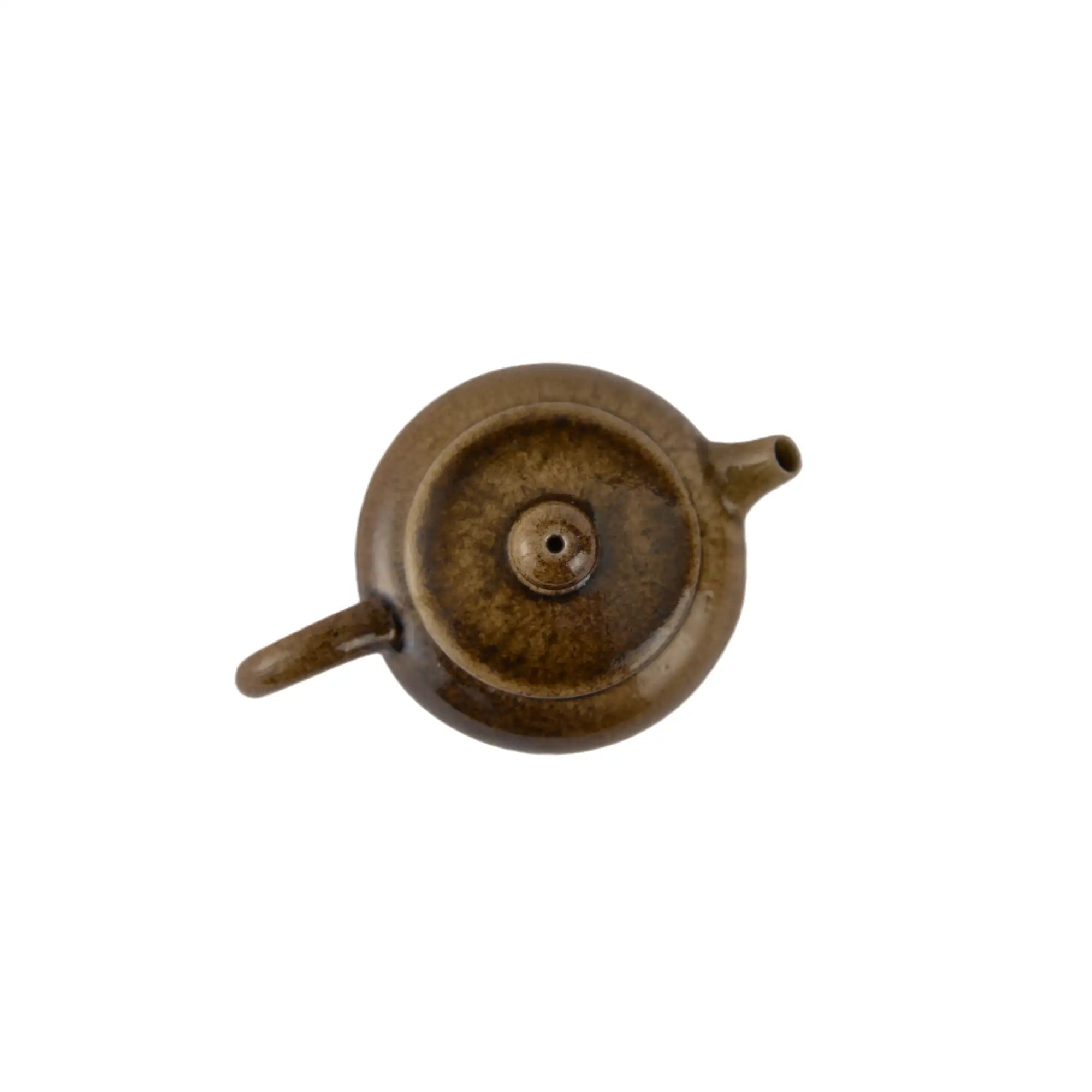 Top view of PorSva No.64 wood-fired clay teapot showing lid structure and firing texture