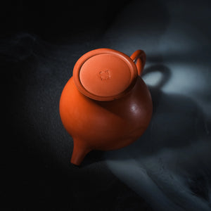 Bottom view of handmade Jianshui red clay Ding teapot