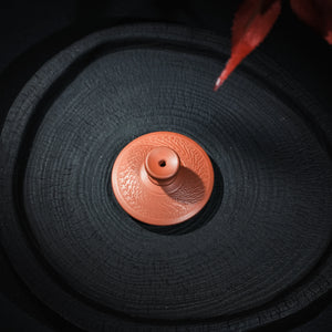 Top view of handmade Jianshui handleless teapot
