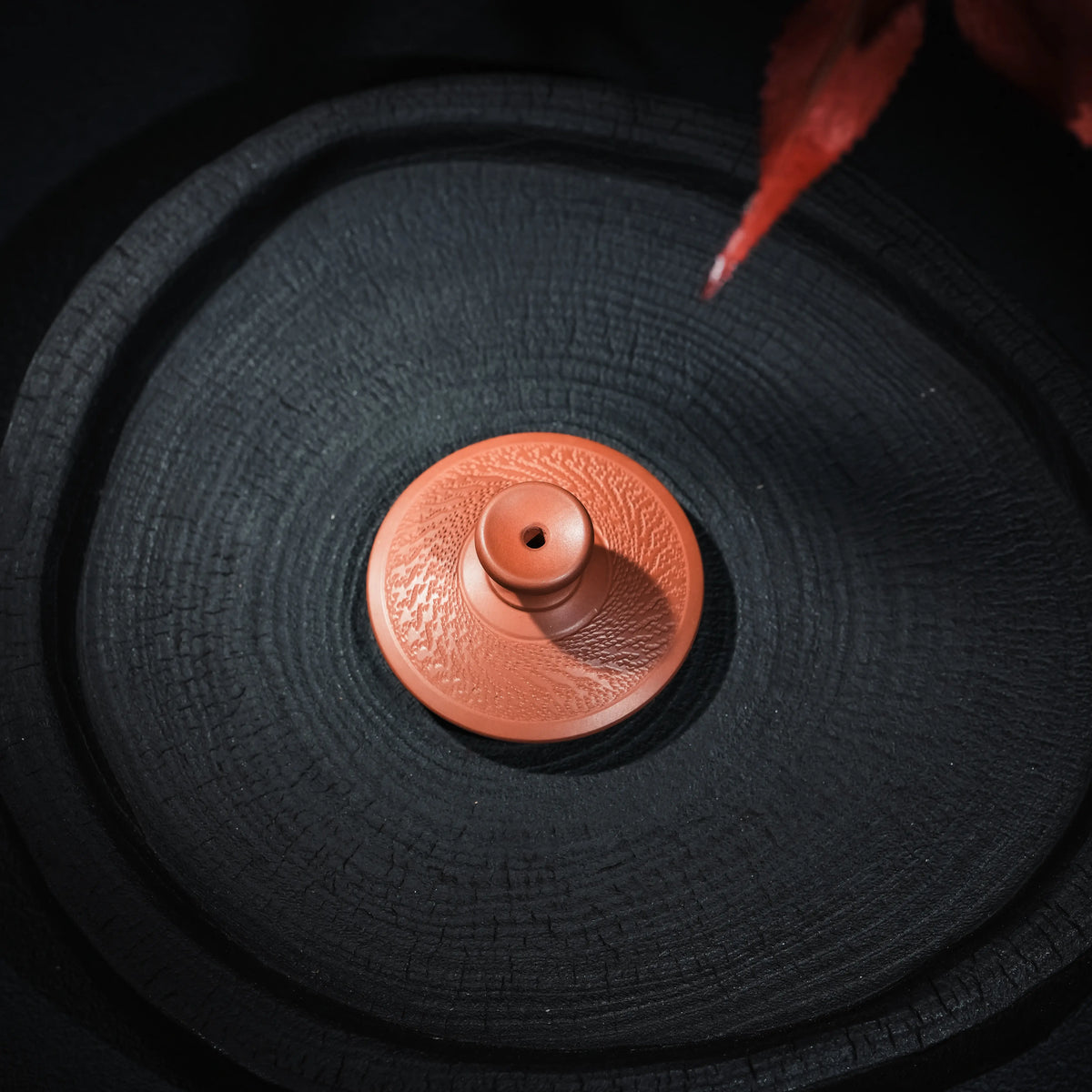 Top view of handmade Jianshui handleless teapot