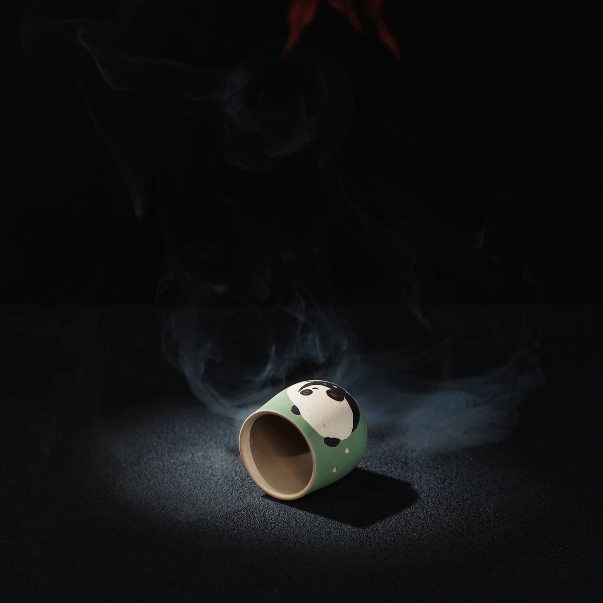 Matching Jianshui panda tea cup from handmade tea set