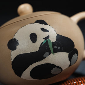 Close view of panda clay inlay decoration on Jianshui teapot