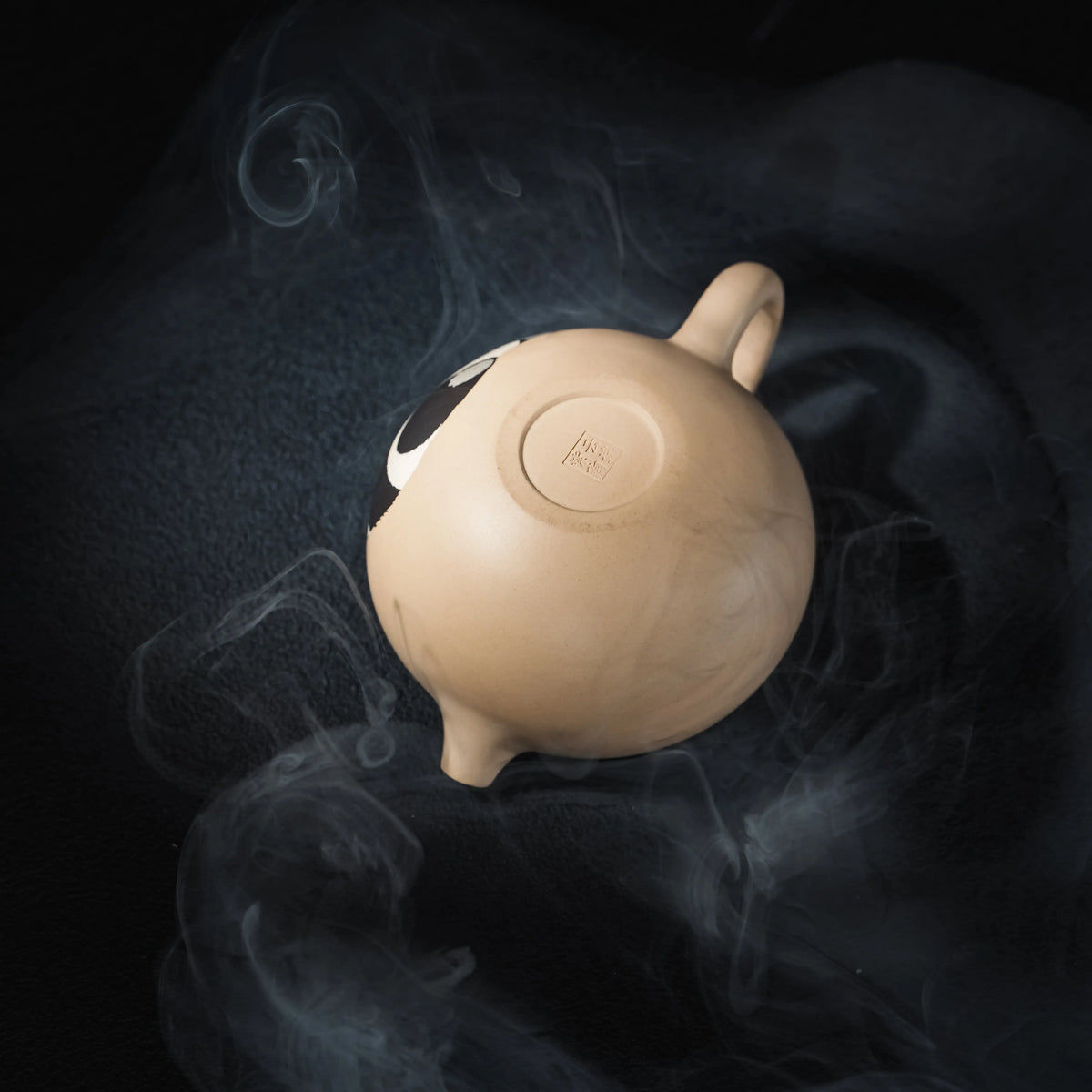 Bottom view of handmade Jianshui panda teapot