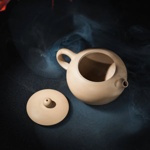 Open Jianshui panda teapot with lid beside the body