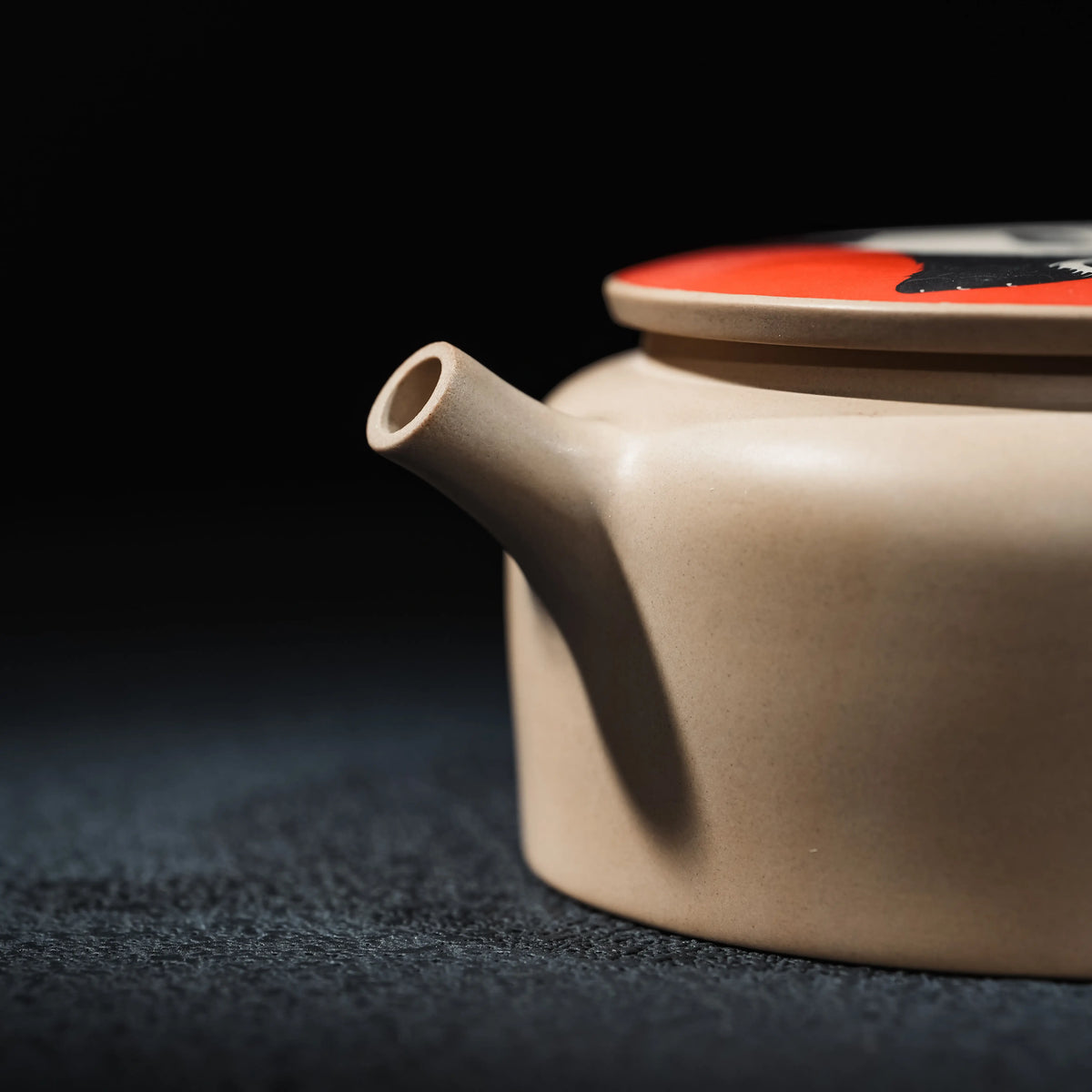 Spout and low rounded body of handmade Jianshui panda teapot