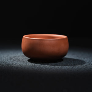 Side view of Jianshui plain red clay tea cup, 60ml