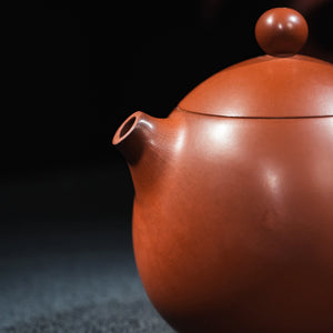 Lid and body detail of handmade Jianshui red clay teapot