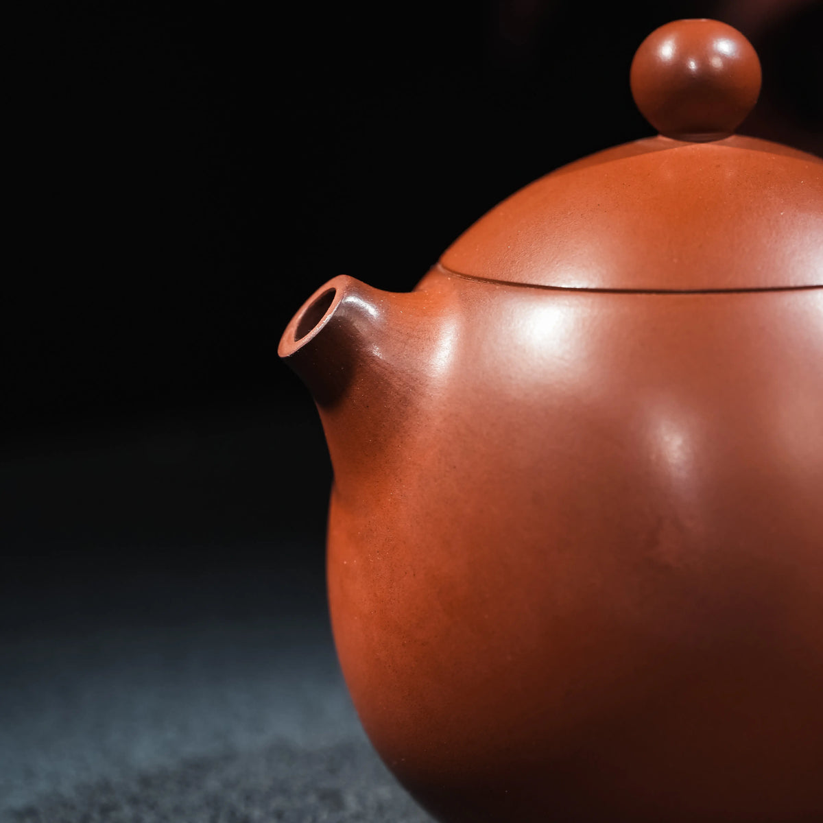 Lid and body detail of handmade Jianshui red clay teapot