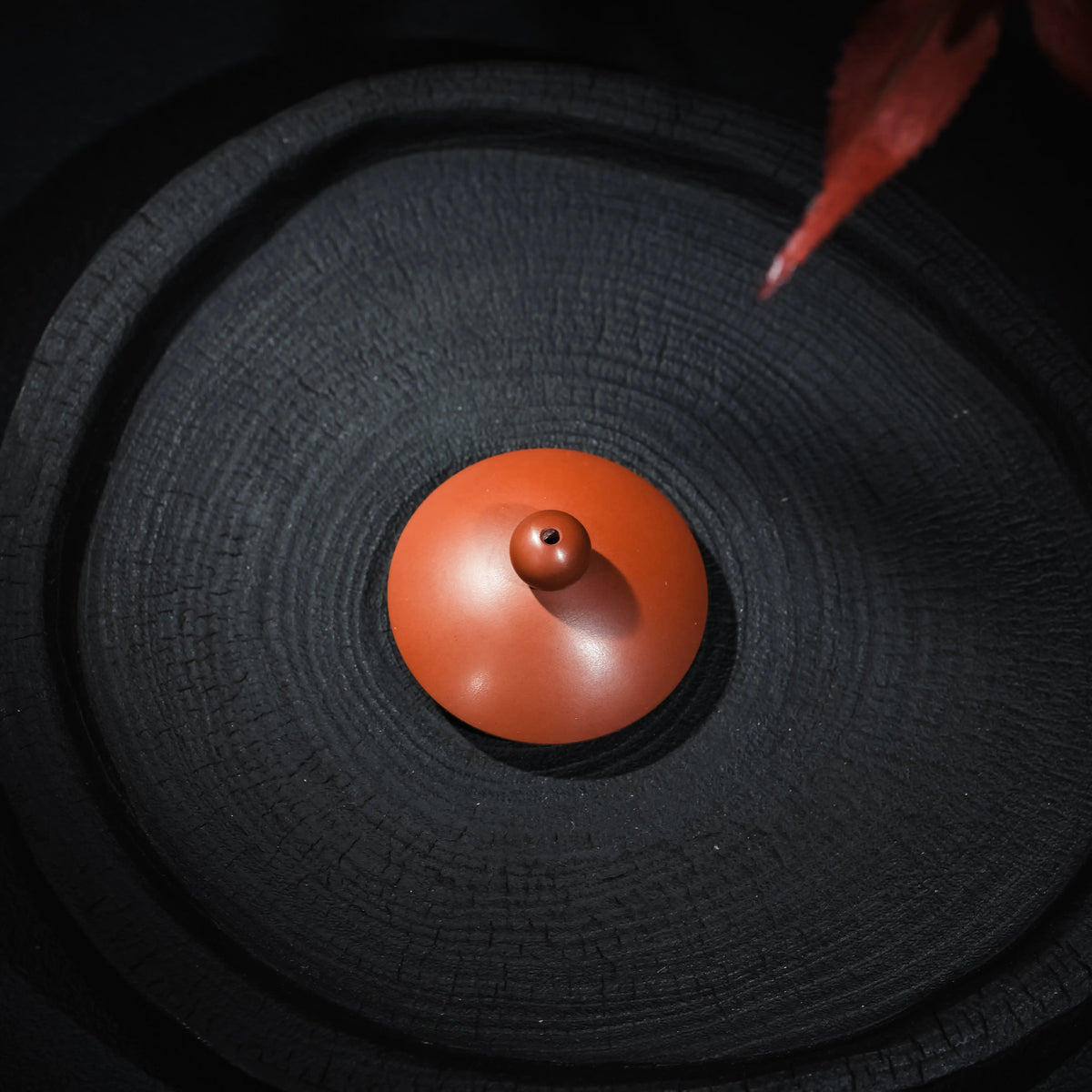 Top view of handmade Jianshui red clay teapot