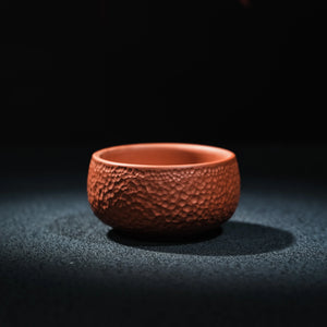 Side view of Jianshui red clay textured tea cup, 60ml