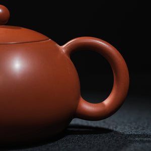 Curved handle of Jianshui red clay Xi Shi teapot