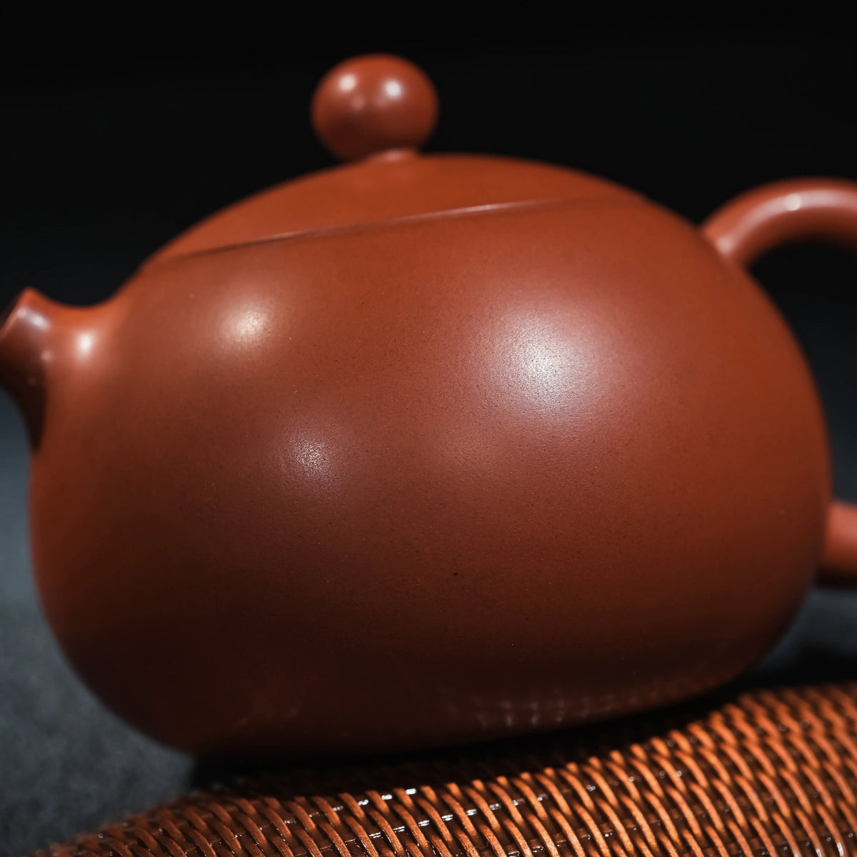 Side view of unglazed Jianshui Xi Shi teapot