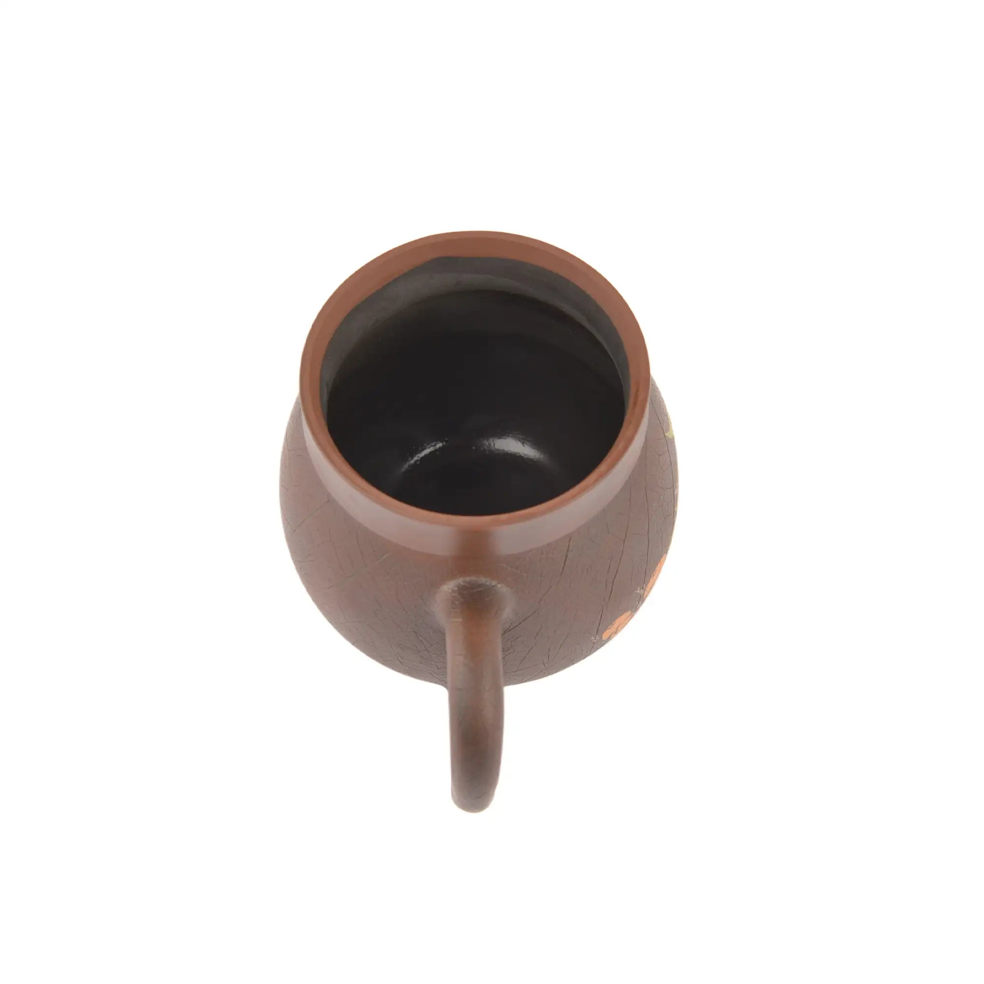 Top view of Jianshui Zitao pottery mug showing natural clay interior and smooth rim