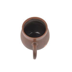 Top view of Jianshui Zitao pottery mug showing natural clay interior and smooth rim