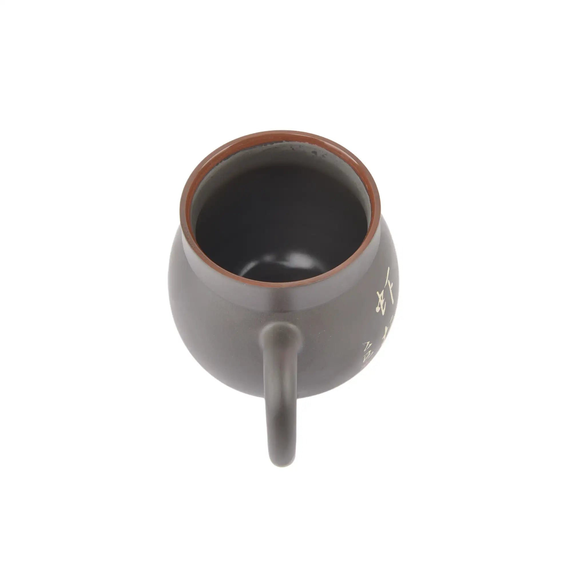 Interior view of Jianshui Zitao pottery mug with natural unglazed clay texture