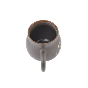 Interior view of Jianshui Zitao pottery mug with natural unglazed clay texture