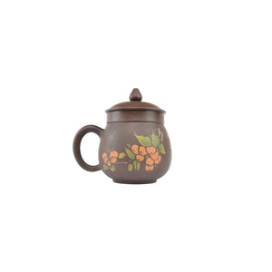 Handmade Jianshui Zitao pottery mug with Yin-carving and Yang-filling, front persimmon motif and Bodhi texture, unglazed clay