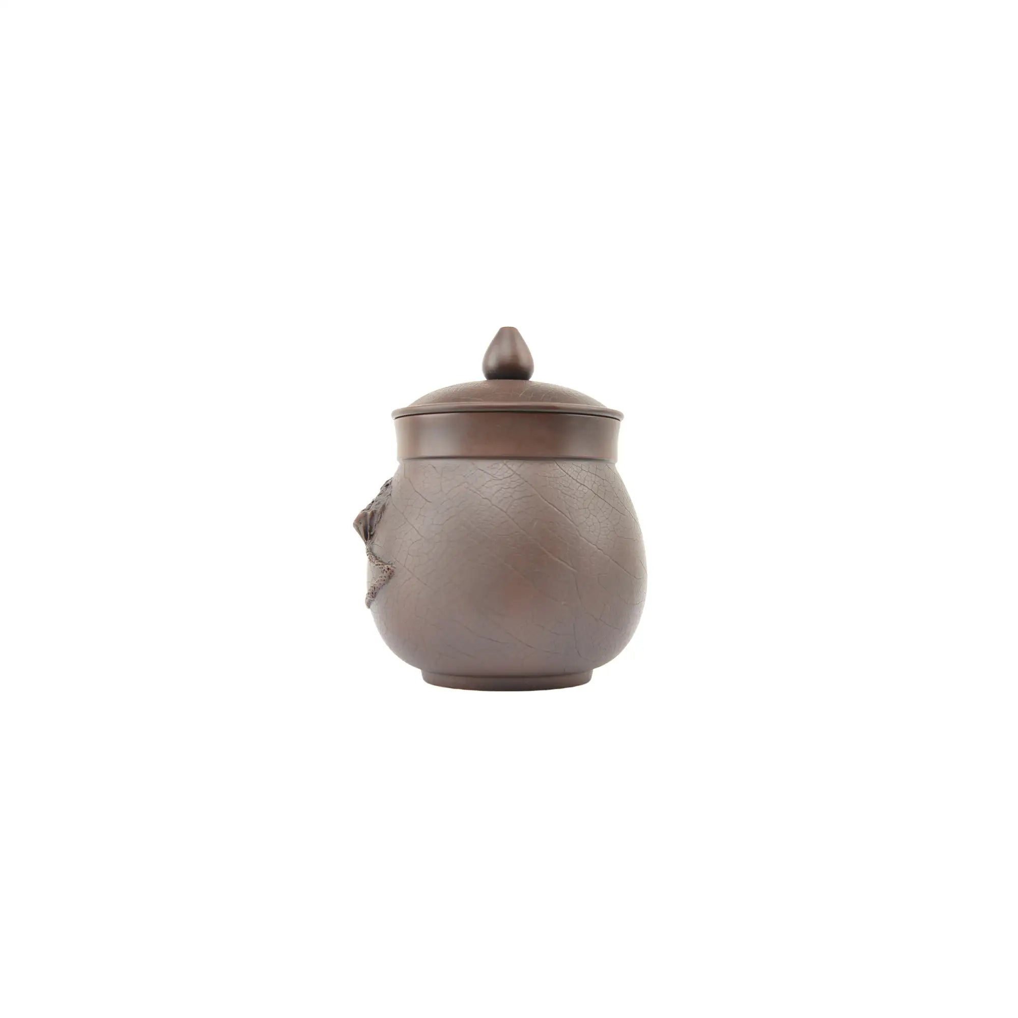 Front view of Jianshui Zitao pottery office mug showing lotus pod relief and handcrafted Bodhi texture