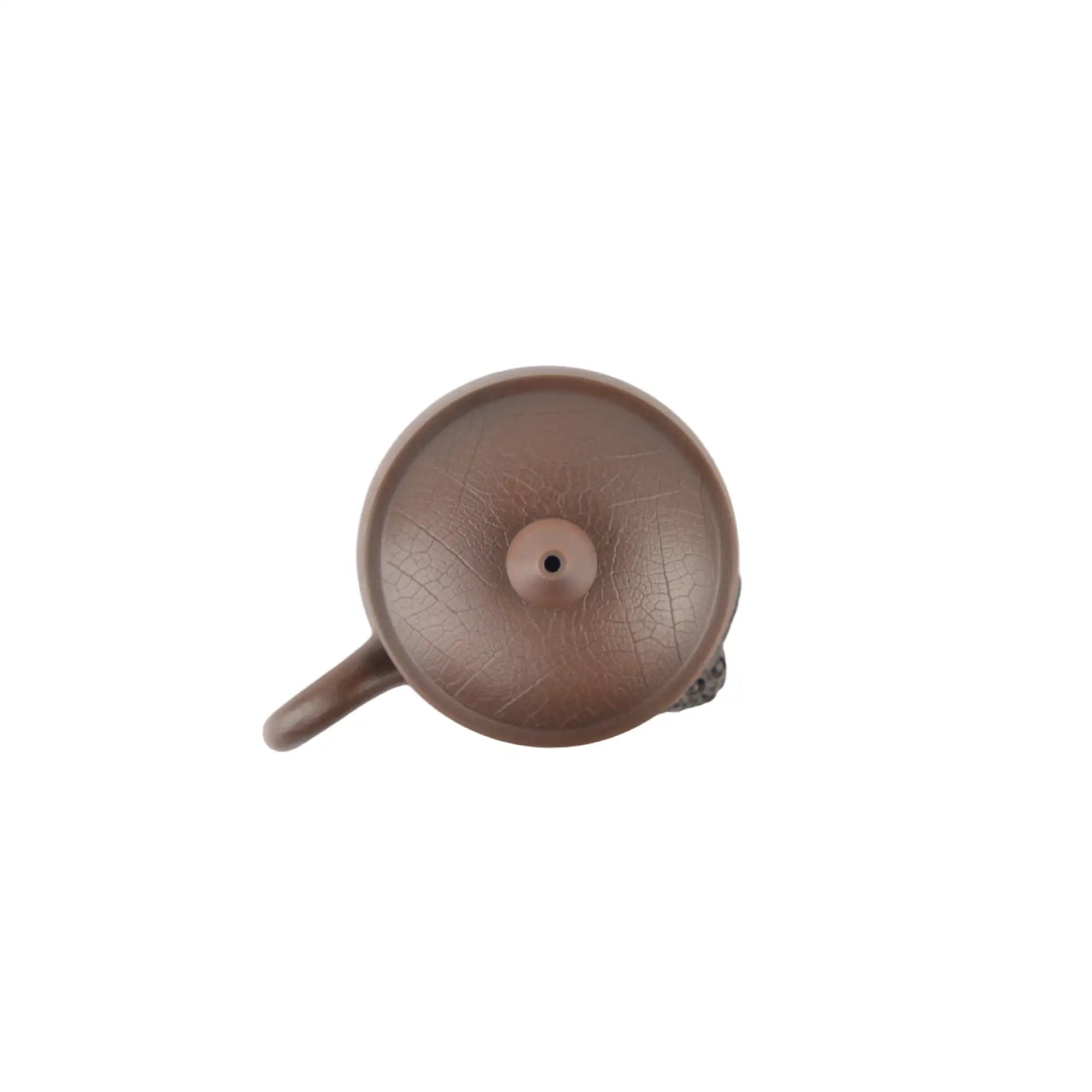Top view of Jianshui Zitao pottery office mug with lid, showing natural clay texture and handcrafted form
