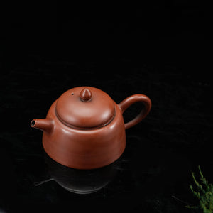 Jianshui plain red clay teapot with natural unglazed finish