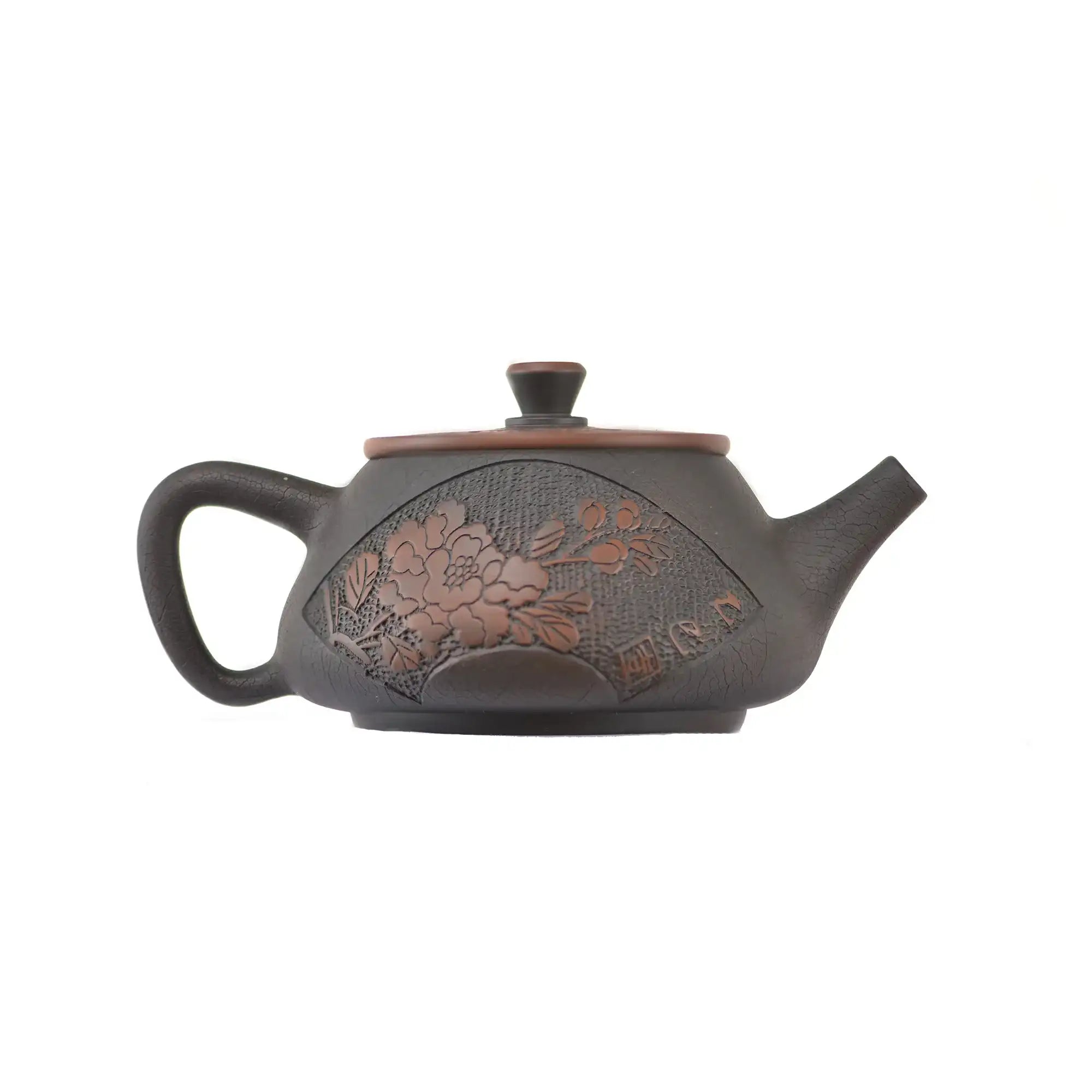 Side view of clay teapot No.23 showing Bodhi pattern texture and peony relief design