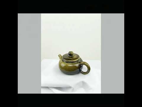 360° rotating view of PorSva No.64 wood-fired Jianshui clay teapot showing natural kiln effects