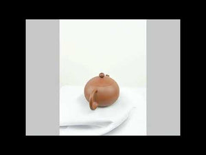 360° rotating view of PorSva No.50 plain red Jianshui clay teapot