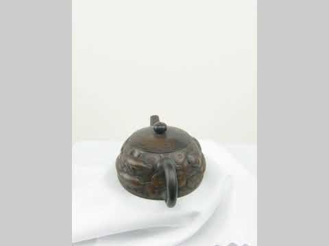 360° rotating view of PorSva No.35 Shipiao fully carved coin and fish clay teapot