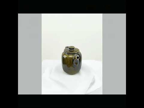 360° rotating view of PorSva No.66 wood-fired Jianshui clay teapot showing natural kiln effects