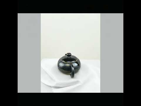 360° rotating view of PorSva No.60 wood-fired Jianshui clay teapot showing natural kiln effects