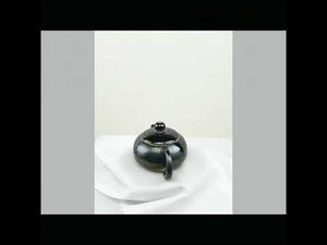 360° rotating view of PorSva No.60 wood-fired Jianshui clay teapot showing natural kiln effects