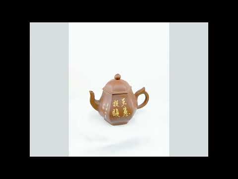 360° rotating view of PorSva No.54 hexagonal red Jianshui clay teapot with floral and calligraphy carving