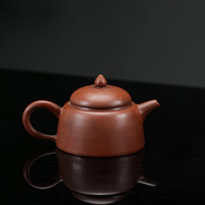 Front view of handmade Jianshui red clay gongfu teapot