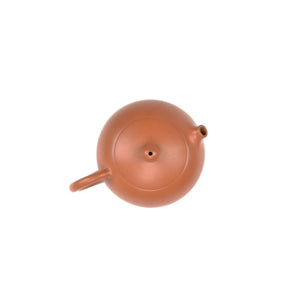 Top view of PorSva No.50 plain red Jianshui clay teapot showing lid structure and craftsmanship