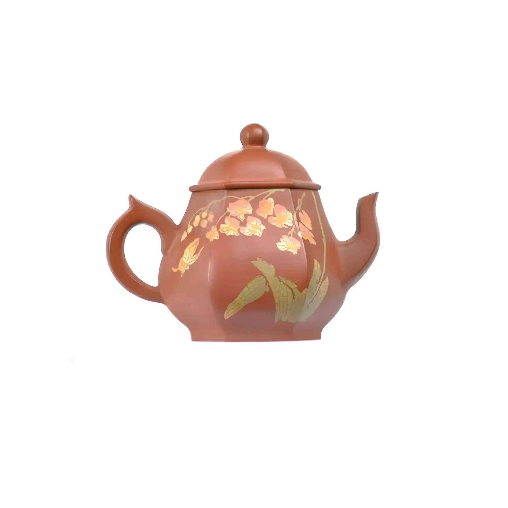 Right side view of PorSva No.54 hexagonal red clay teapot showing detailed floral carving with clay inlay