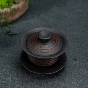 Top view of handmade Jianshui rustic clay gaiwan