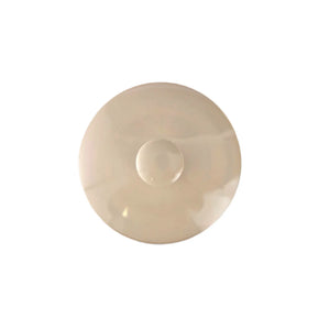 Top view of a handmade pottery tea canister lid with unglazed burnished surface.