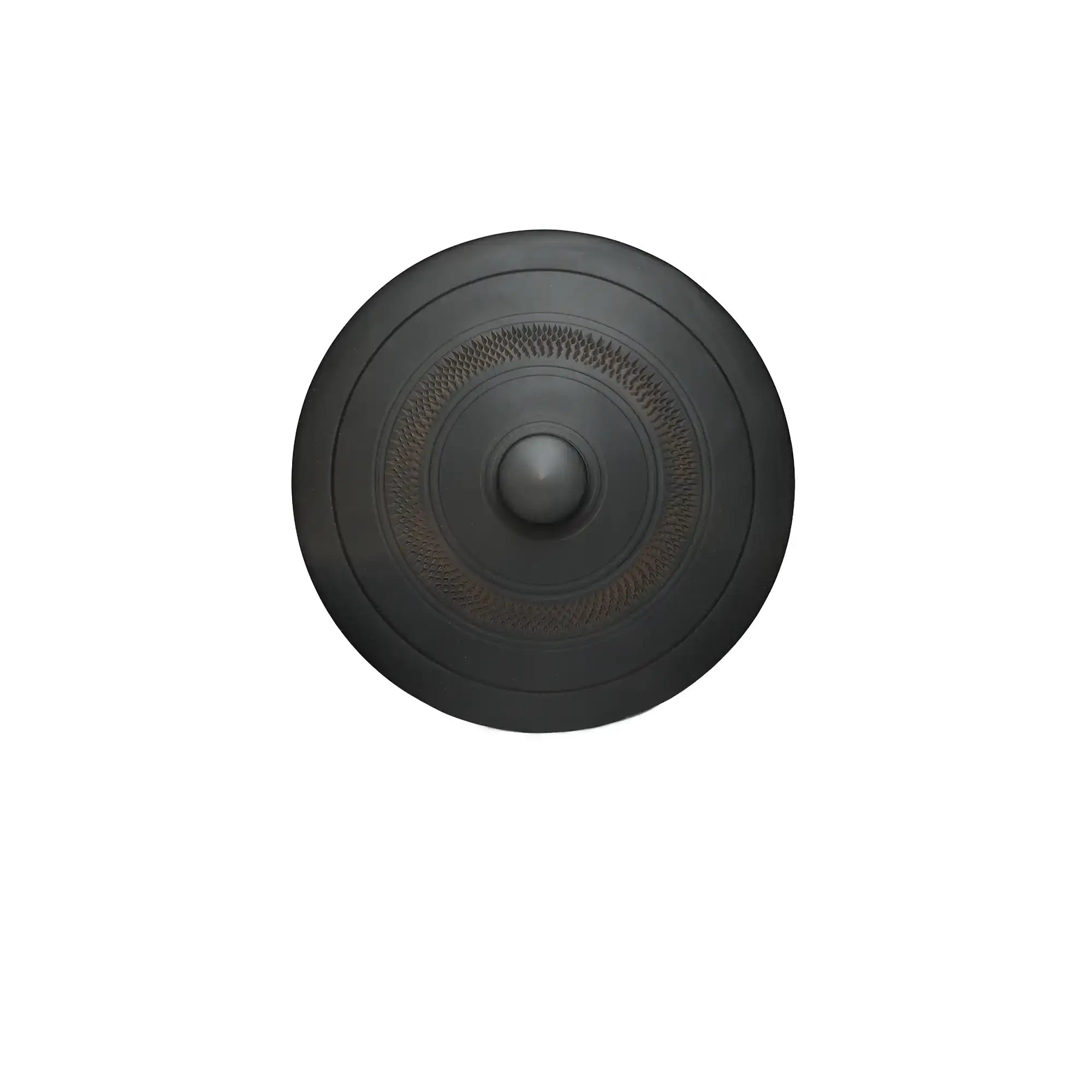 Top view of a handmade pottery tea cake storage box lid, featuring a raised center knob and a circular band of hand-carved jump-cut texture on a matte black surface.