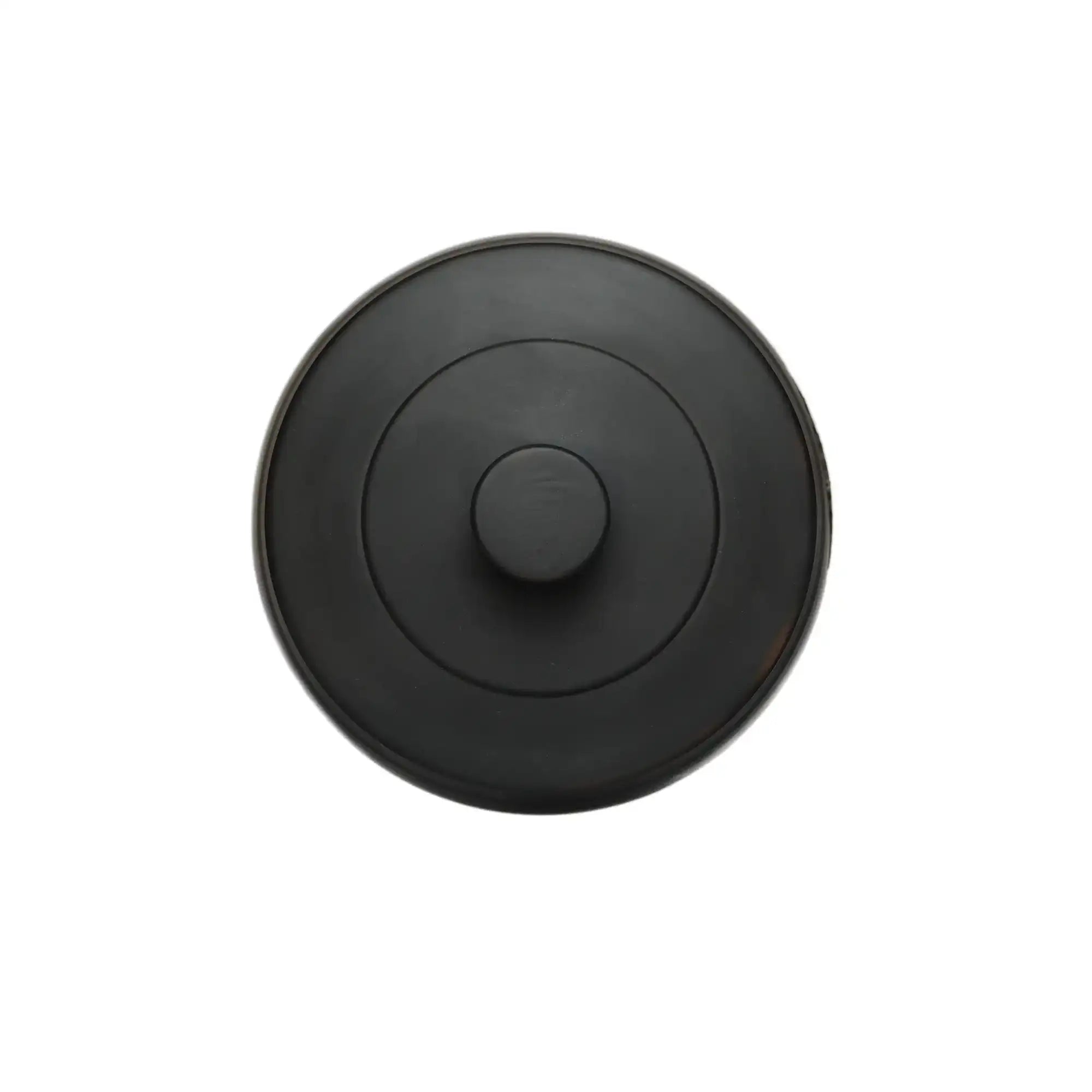 Top view of the tea canister lid, featuring a smooth matte black finish with concentric circular lines and a centered round knob.