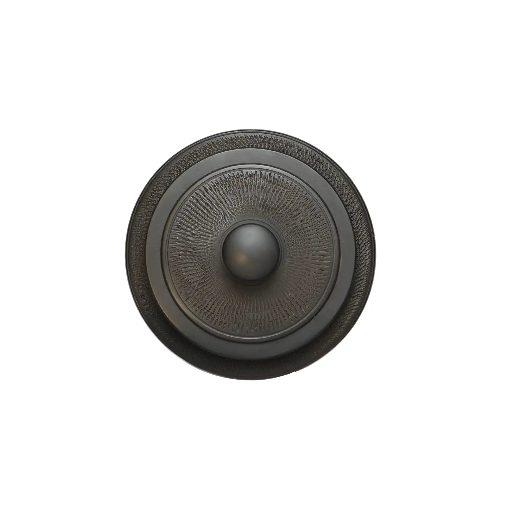 Top view of a Jianshui zitao tea canister lid featuring a raised center knob and finely carved radial texture