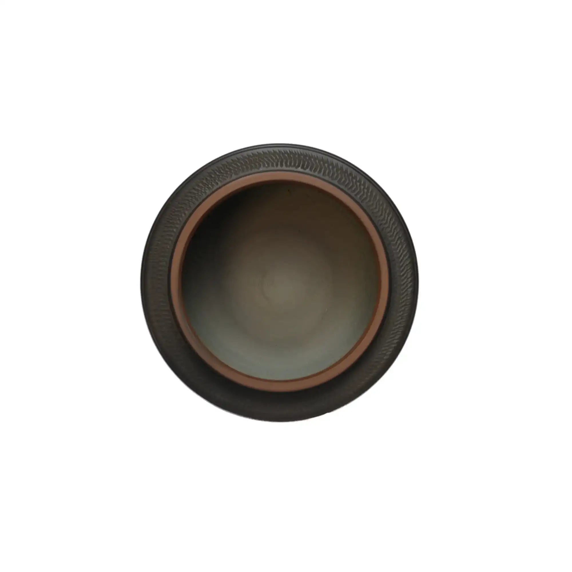 Top-down view of a Jianshui zitao tea canister showing the smooth unglazed interior and subtly textured rim