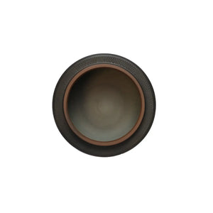 Top-down view of a Jianshui zitao tea canister showing the smooth unglazed interior and subtly textured rim