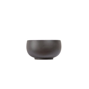 Jianshui zitao tea cup with a smooth rounded form and black matte finish