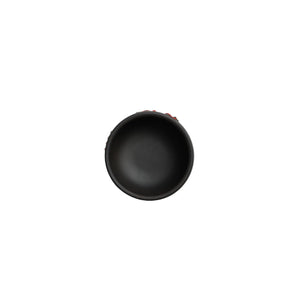 Interior view of a Jianshui zitao stoneware tea cup with smooth matte black finish