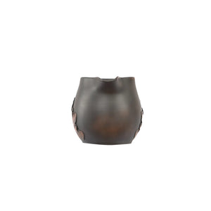 Front view of a Jianshui zitao fairness pitcher with lotus leaf relief carving and a smooth unglazed finish